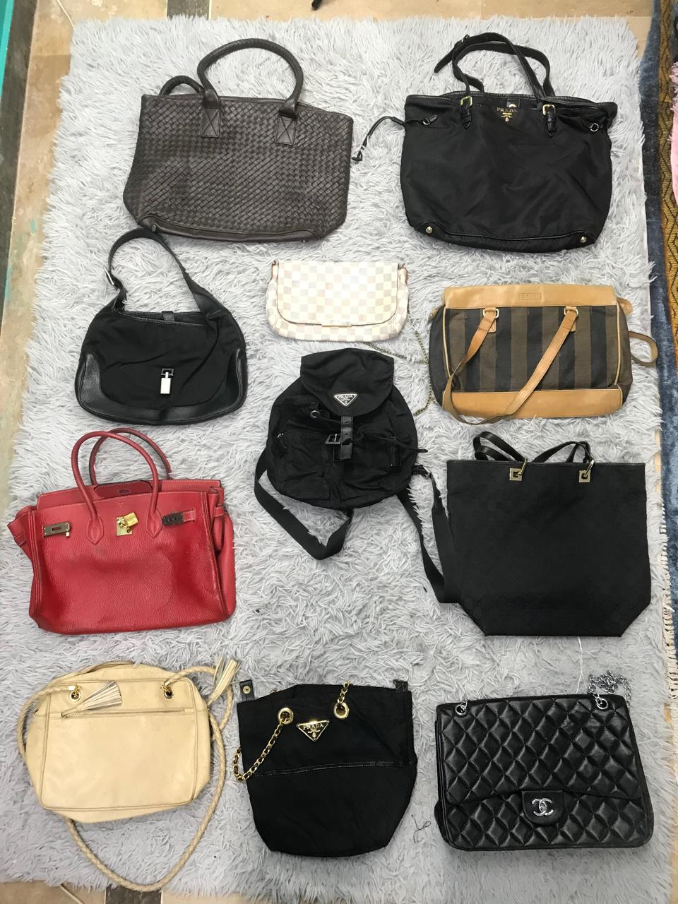 Louis Vuitton, Prada, Fendi, Bottega Veneta und Gucci Taschen 